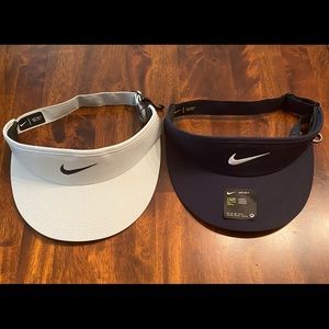 Two Nike Dri-fit visors